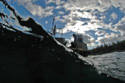 Dive boat on wavy, windy day. Tobermory, Ontario. D70, 10... by David Heidemann 
